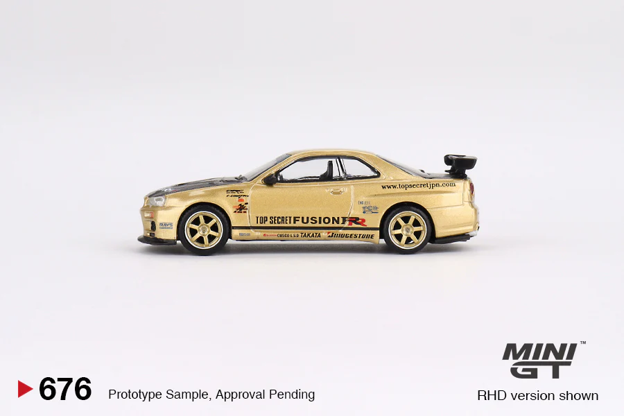 MINI GT #676 Nissan Skyline GT-R (R34) Top Secret Top Secret Gold Japan Exclusive - Image 3